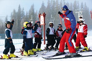 Danske skiinstruktører er populære blandt børnene på skiskolen